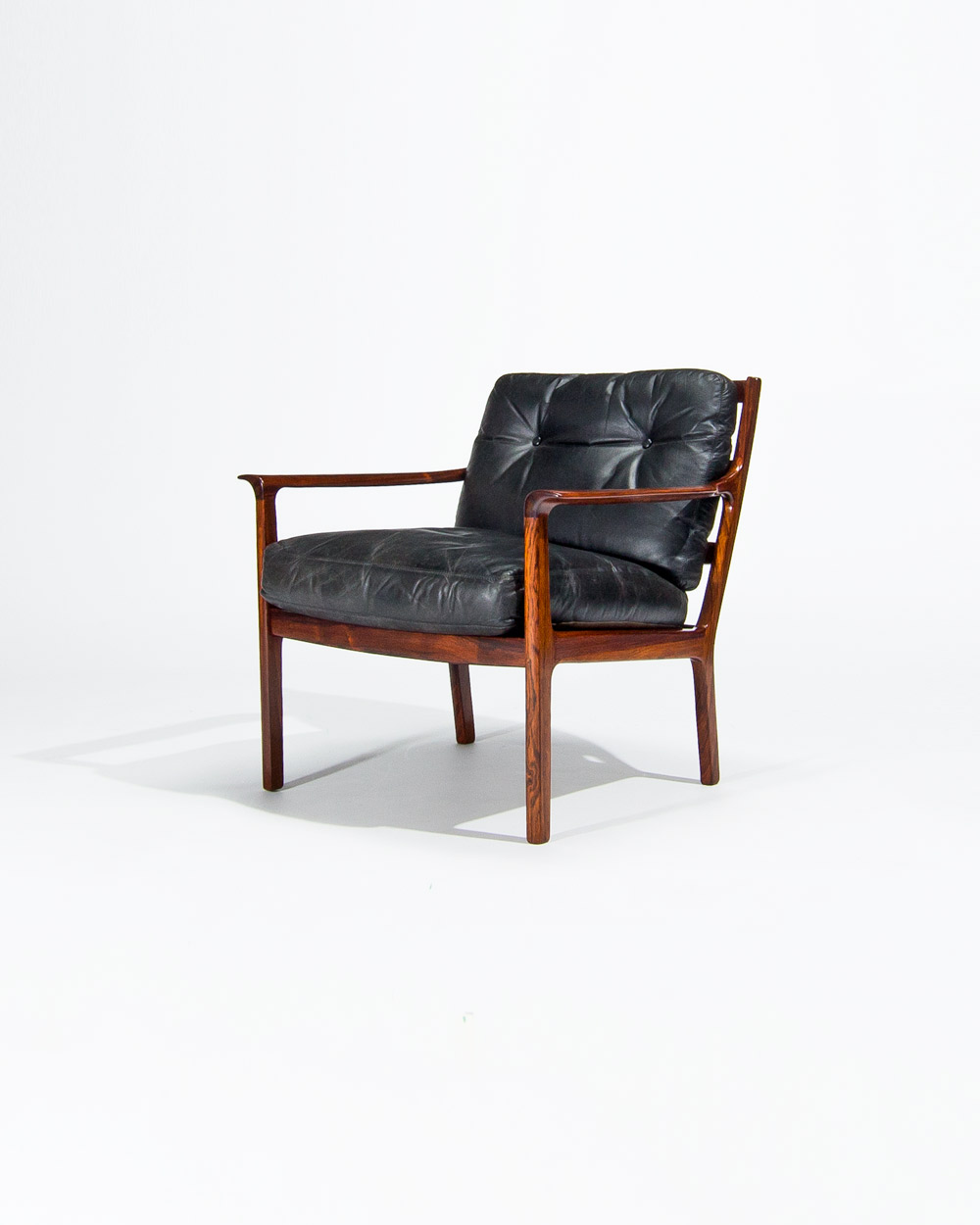 Mid century rosewood armchairs black leather dansih design london