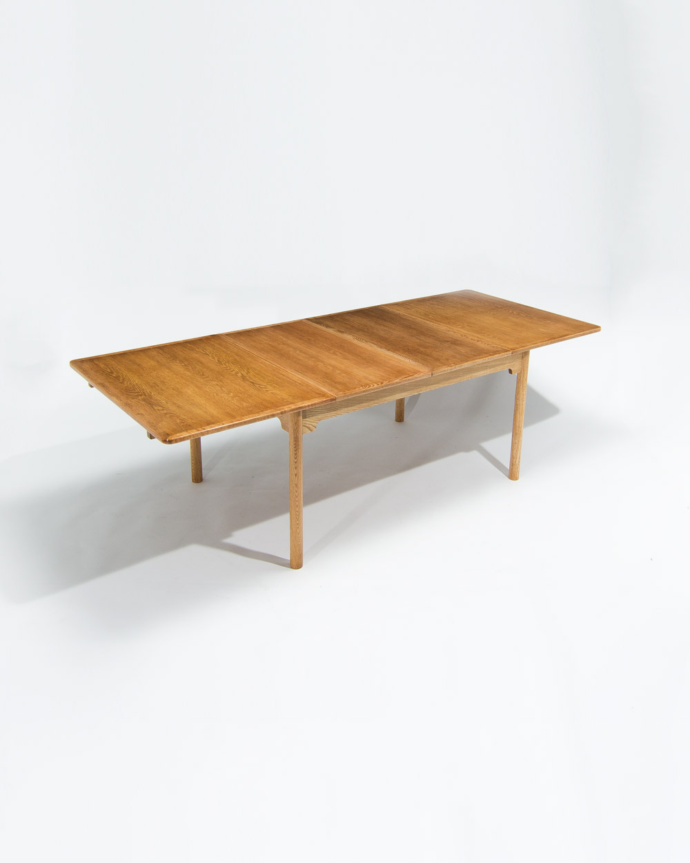Borge Mogensen oak dining table shown extended with two additional leaves, Swedish 1950s design