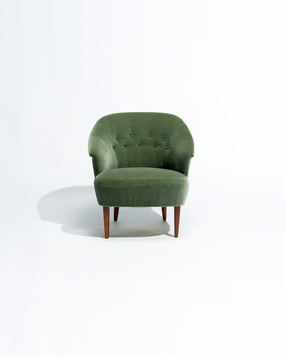 front view of Carl Malmsten Swedish lounge chair from the 1950s upholstered in green mohair velvet