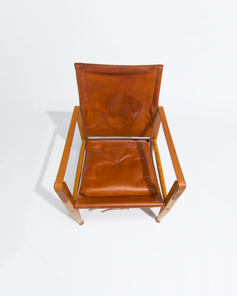 Buttoned leather seat cushion detail on Kaare Klint Safari chair