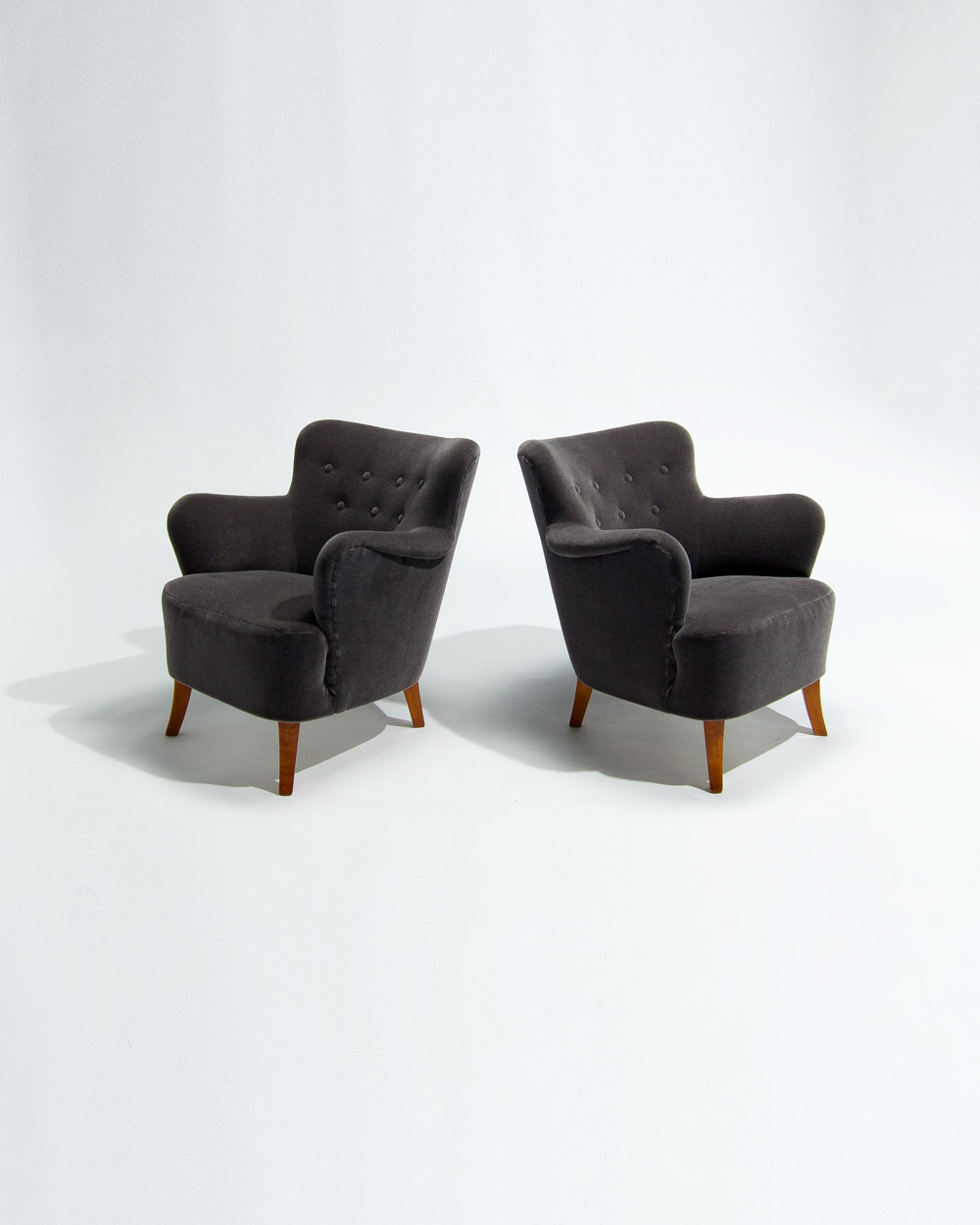 Profile of mid century Finnish armchairs in grey mohair velvet by Rose Uniacke