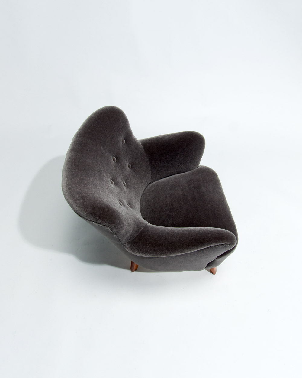 Close view of grey mohair velvet by Rose Uniacke on mid century lounge chair