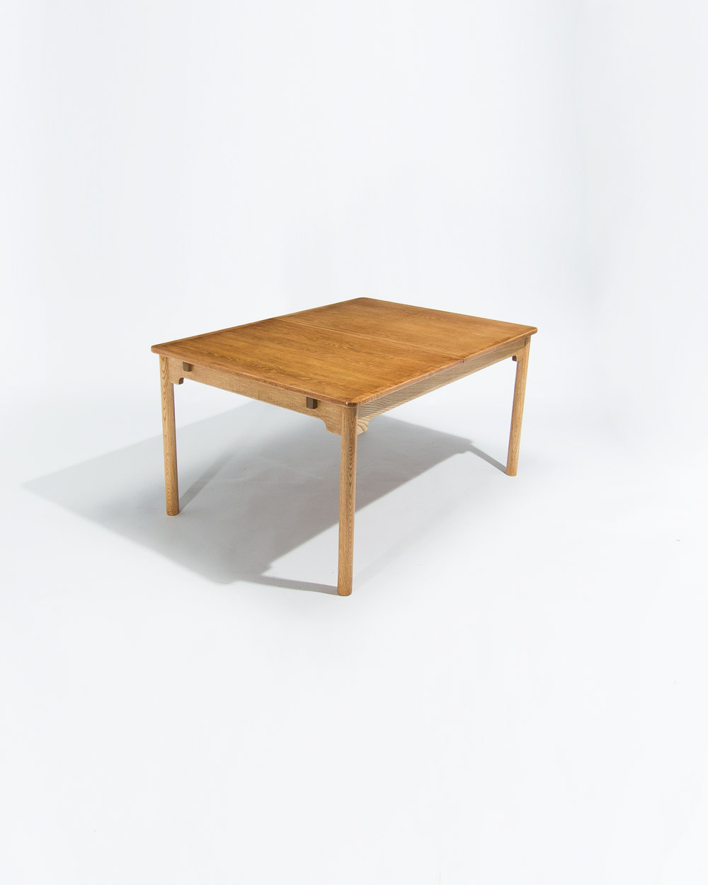 Side angle of Borge Mogensen oak dining table, mid century Swedish design in solid oak