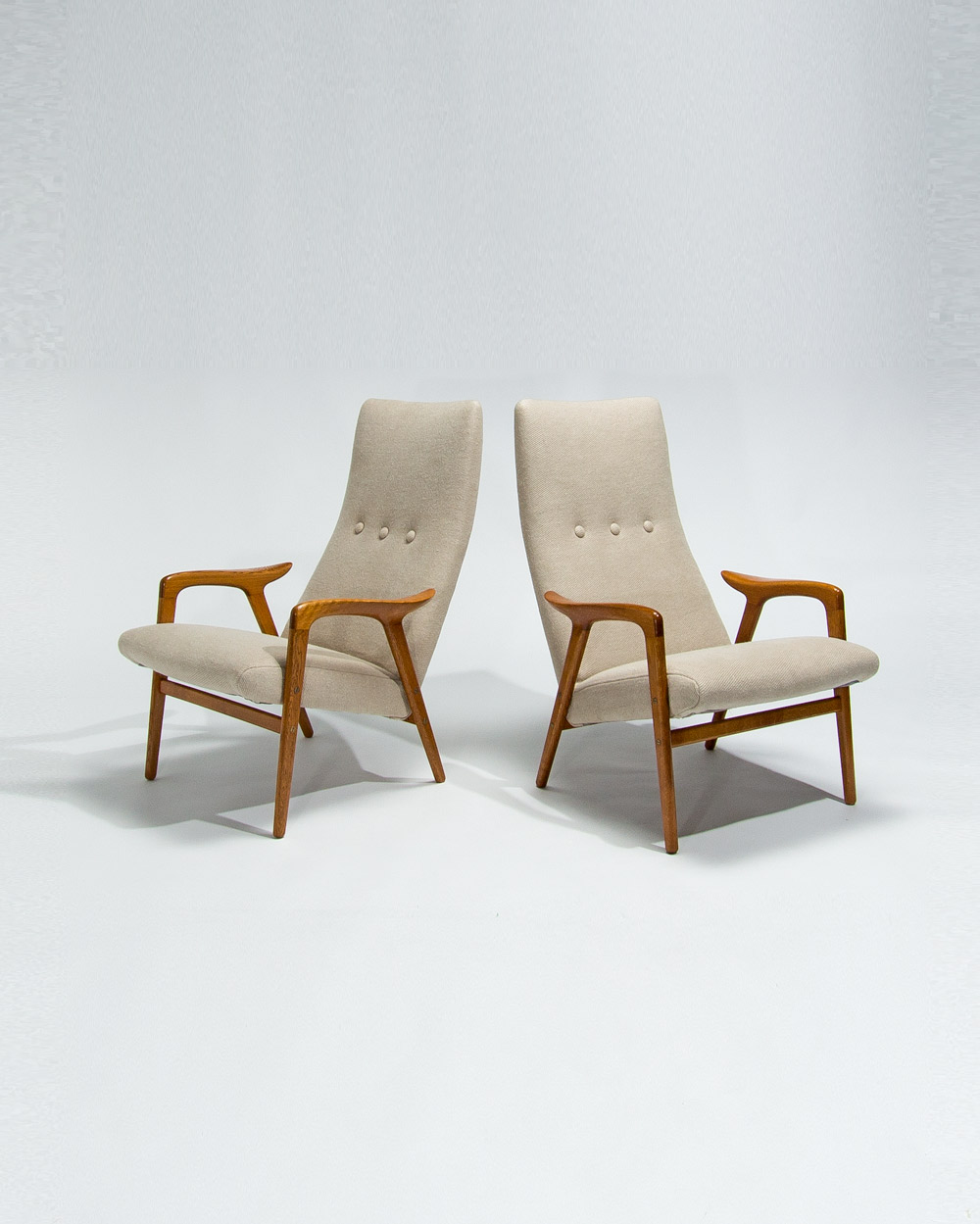 Swedese lounge chairs by Yngve Ekstrom showing oak frame and Pierre Frey linen upholstery