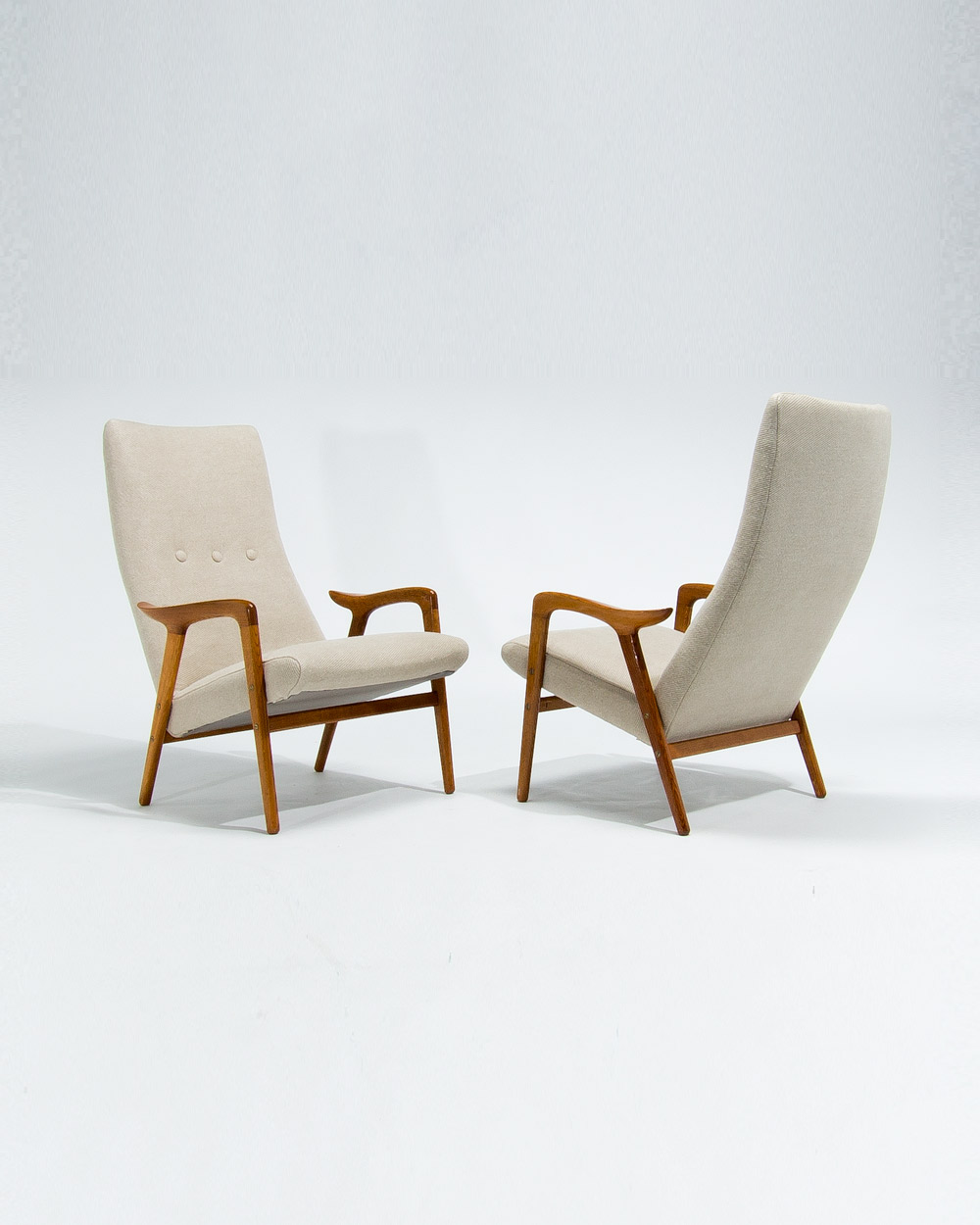Pair of Yngve Ekstrom lounge chairs for Swedese, Sweden 1950s, upholstered in Pierre Frey linen